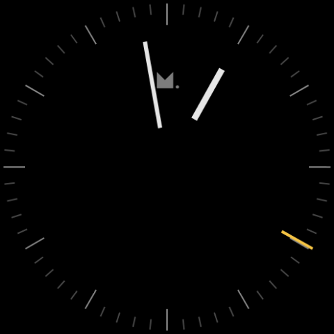 Analog idle clock with a yellow second hand and the Meticulous logo
